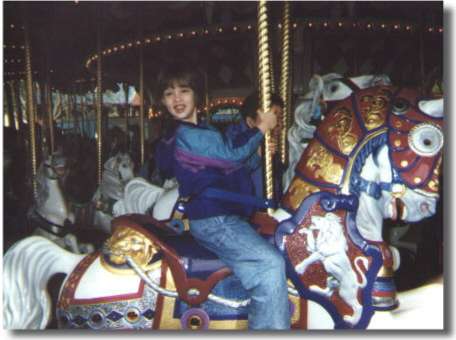 Thersa on Carousel at Disney